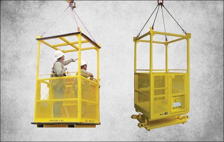 Two men stand in a yellow lift, looking around as it ascends.